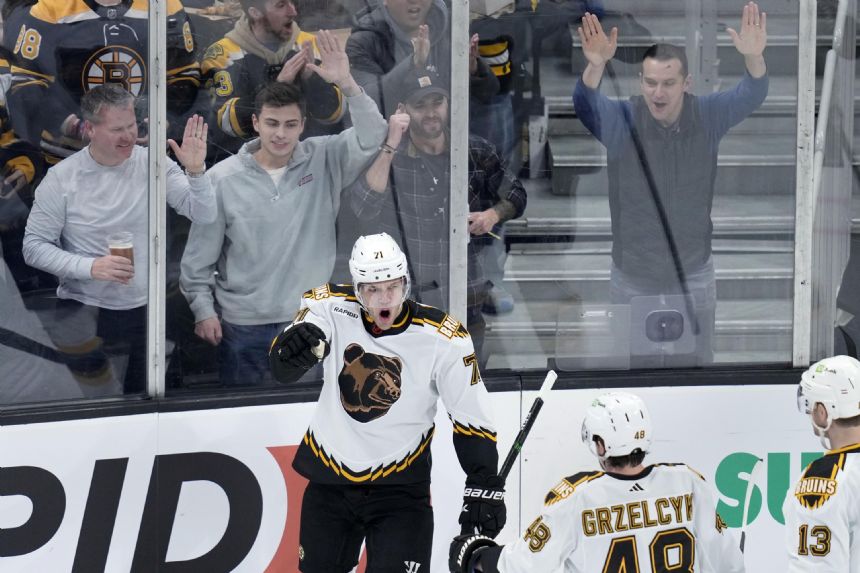 Bruins' NHL-record season-opening home win streak at 13