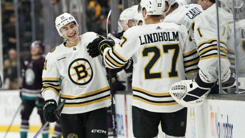 Bruins rally past Ducks, extend season-opening win streak to five