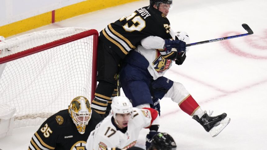 Bruins' McAvoy suspended 4 games for an illegal check to the head of Panthers' Ekman-Larsson