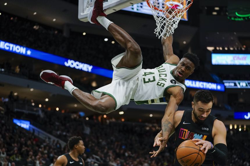 Bucks rout short-handed Heat 124-102 without Antetokounmpo
