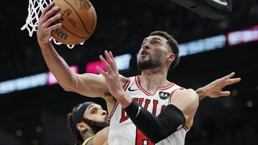 Bulls star LaVine misses game against Bucks because of sore right foot