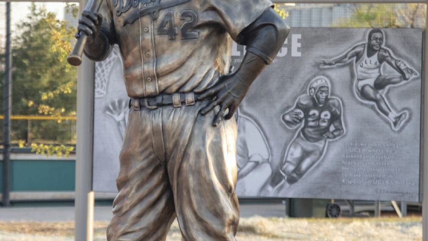 Burned remnants of prized Jackie Robinson statue found after theft from public park in Kansas