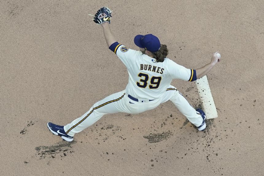 Burnes, Brewers blank Cards 2-0, move alone atop NL Central
