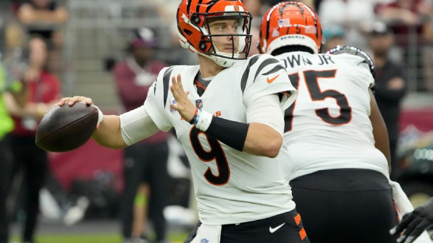 Burrow connects with Chase for 3 TDs; Bengals roll past the Cardinals 34-20