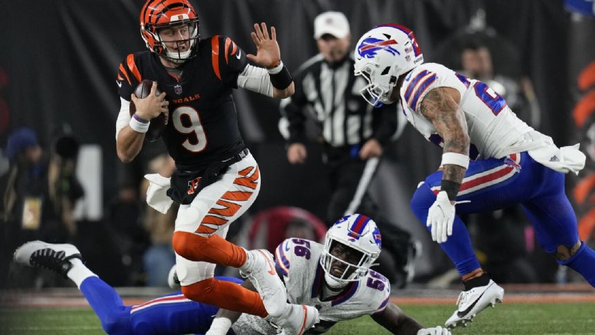 Burrow passes for 348 yards and 2 TDs and Bengals' defense clamps down on Bills in 24-18 win