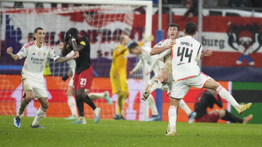 Cabral's backheel goal in stoppage time secures a spot for Benfica in Europa League playoffs