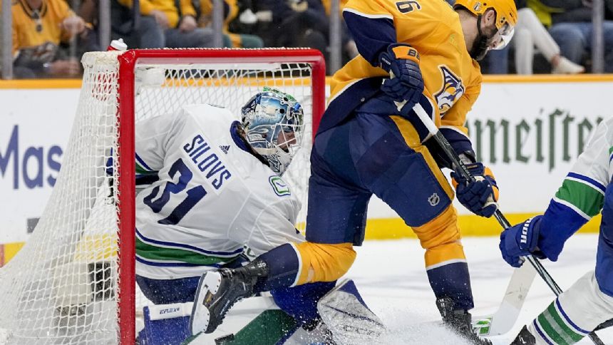 Canucks advance to 2nd round, beating Predators 1-0 in Game 6 on Pius Suter's late goal