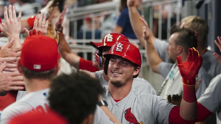 Cardinals hit 4 HRs for 2nd straight game, beat MLB-leading Braves 11-6