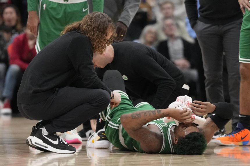 Celtics G Smart, C Williams leave injured against Raptors