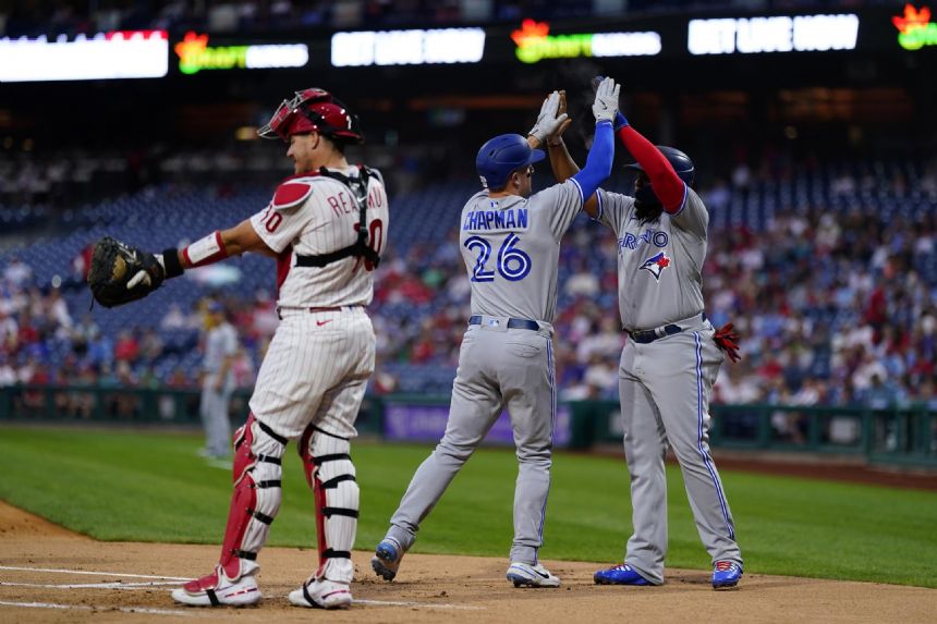 Chapman, Bradley go deep, Blue Jays outslug Phillies 18-11