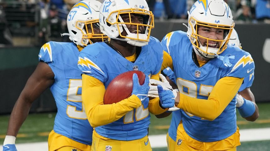 Chargers roll past Jets 27-6 behind Davis' punt return, Ekeler's 2 TDs and LA's sack-happy defense