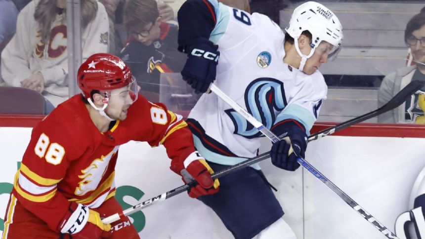Chris Driedger makes 37 saves in NHL return as Kraken hold off Flames 2-1