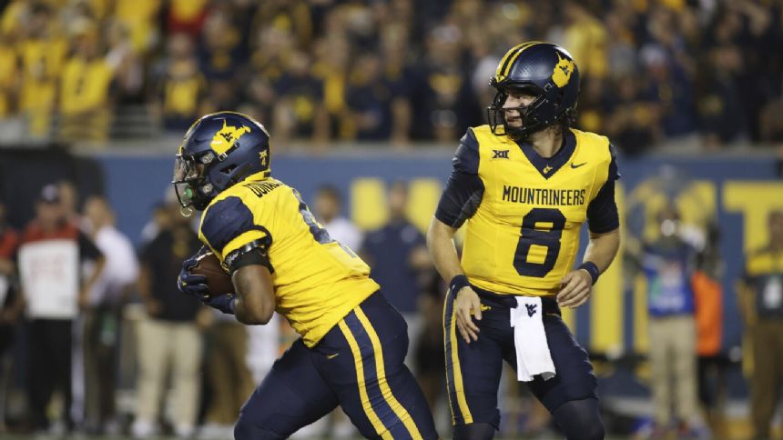 CJ Donaldson, Garrett Greene hurt in West Virginia's 17-6 win over Pittsburgh in 'Backyard Brawl'