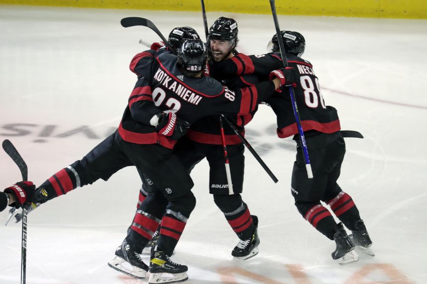Cole lifts Hurricanes past Rangers 2-1 in OT in Game 1