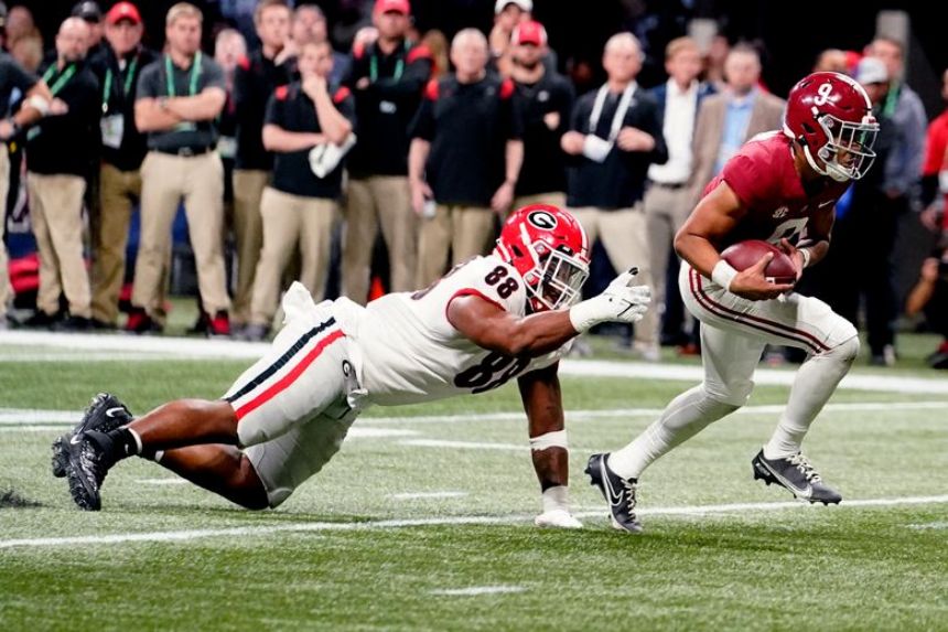 COLLEGE FOOTBALL TODAY: Young leads Tide over Georgia