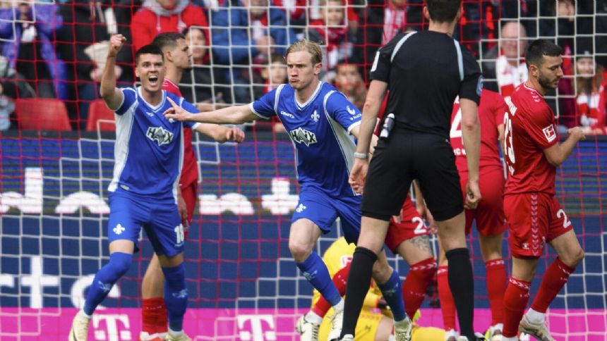 Cologne left contemplating Bundesliga relegation after home loss to last-place Darmstadt