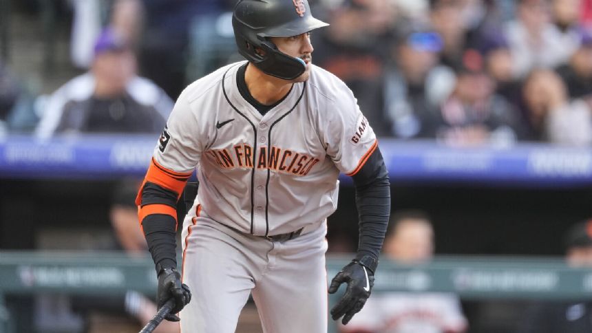 Conforto homers to spark 6-run inning and Giants beat skidding Rockies 8-6