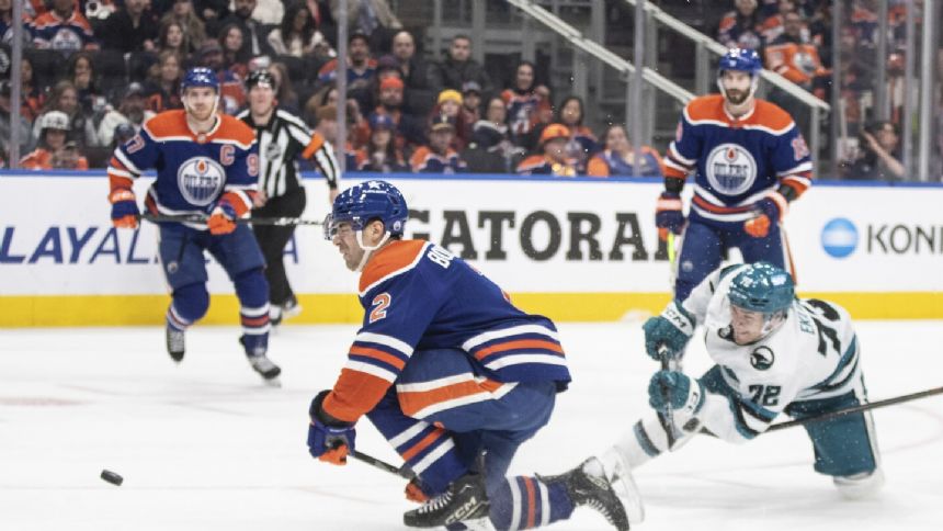 Connor McDavid becomes 4th in NHL history with 100 assists as the Oilers rout the Sharks 9-2