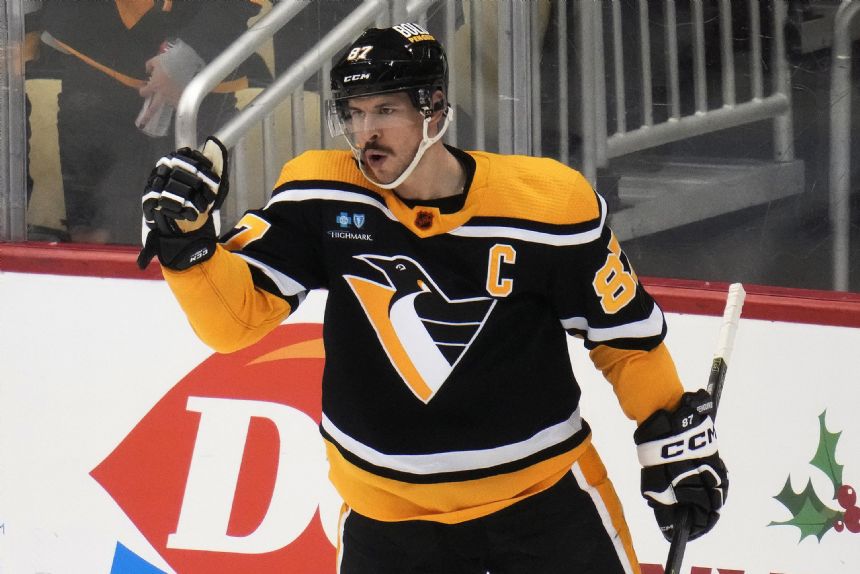 Crosby, Malkin help Penguins snap Rangers' winning streak