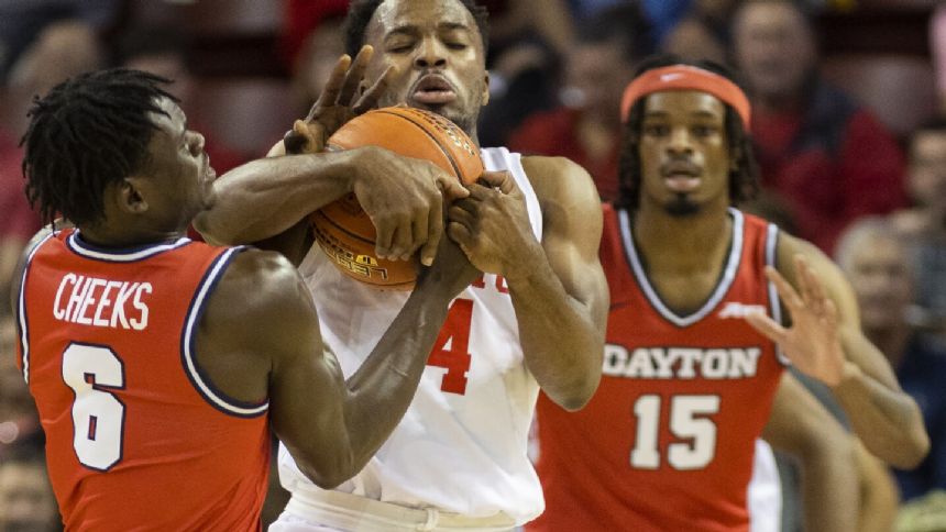 Cryer, Shead lead No. 6 Houston to Charleston title with 69-55 victory over Dayton