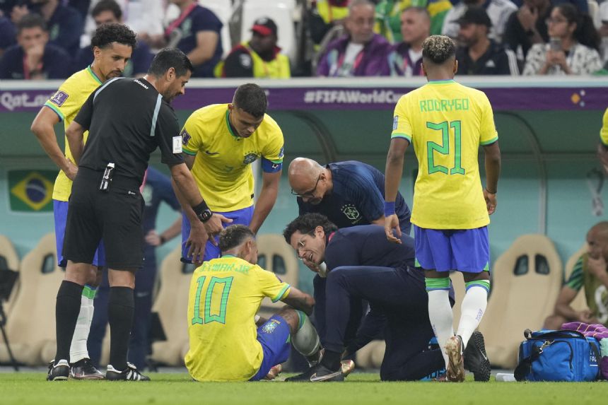 Crying Neymar injures ankle during Brazil's World Cup win