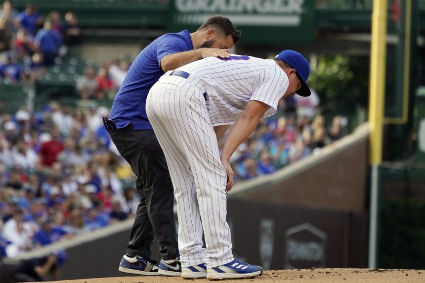 Cubs pitcher Alec Mills exits with back injury vs. Red Sox