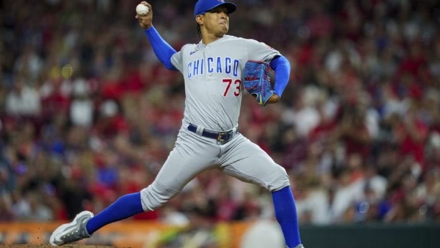 Cubs place closer Alzolay on the 15-day IL and promote top prospect Crow-Armstrong from minors