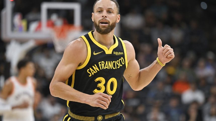 Curry scores 33 points, Warriors overcome Wembanyama, Spurs for 4th straight win