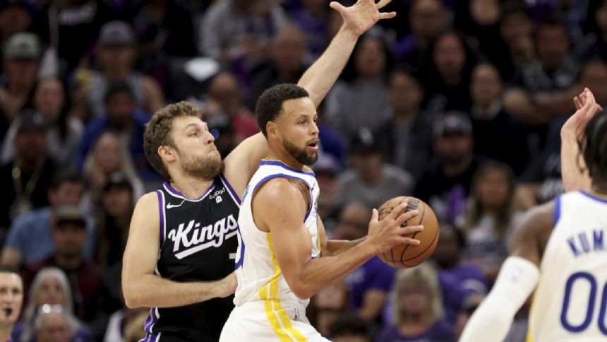Curry scores 41 points to lead the Warriors past the Kings 122-114 in a playoff rematch