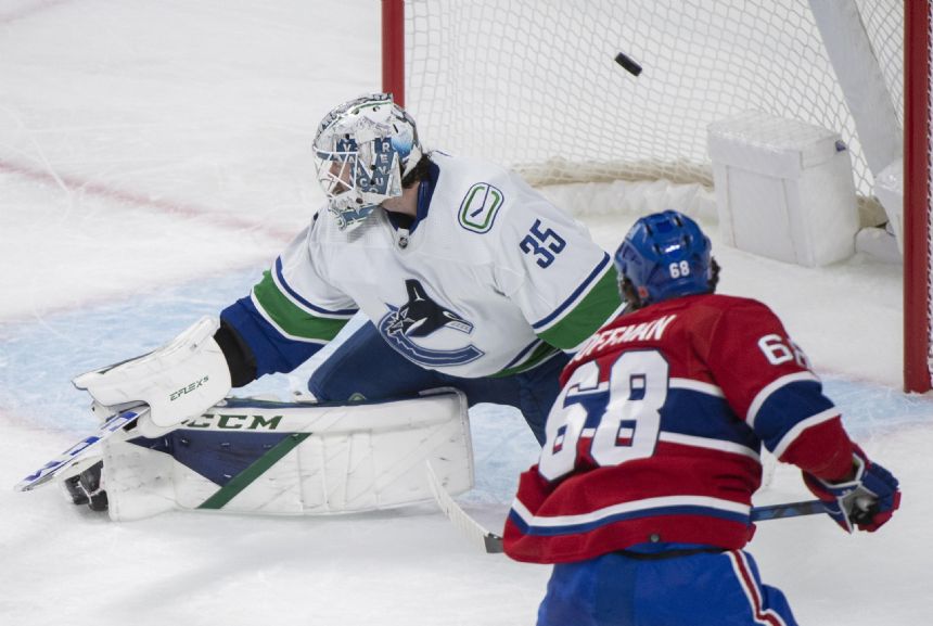 Dach, Montembeault power Canadiens past Canucks 5-2