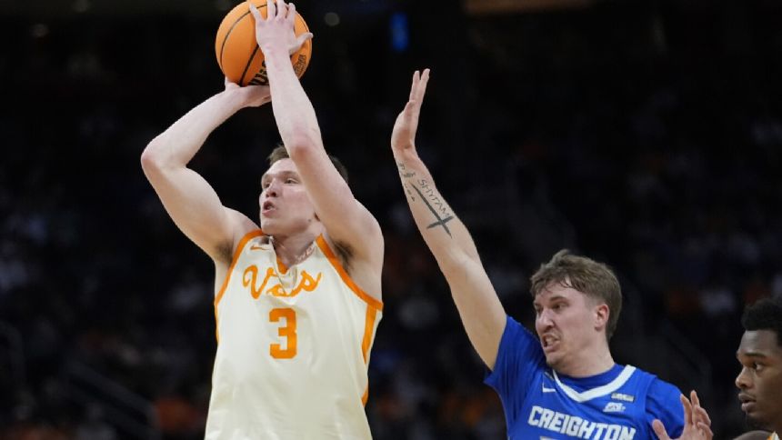 Dalton Knecht scores 24, Tennessee beats Creighton 82-75 to pull within a win of first Final Four