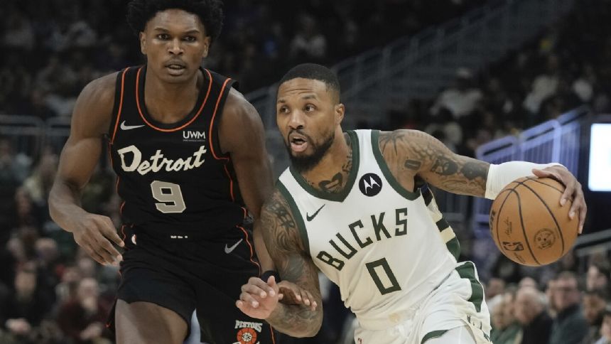 Damian Lillard scores 34 points as the Bucks beat Pistons 120-118; Giannis ejected in 3rd period