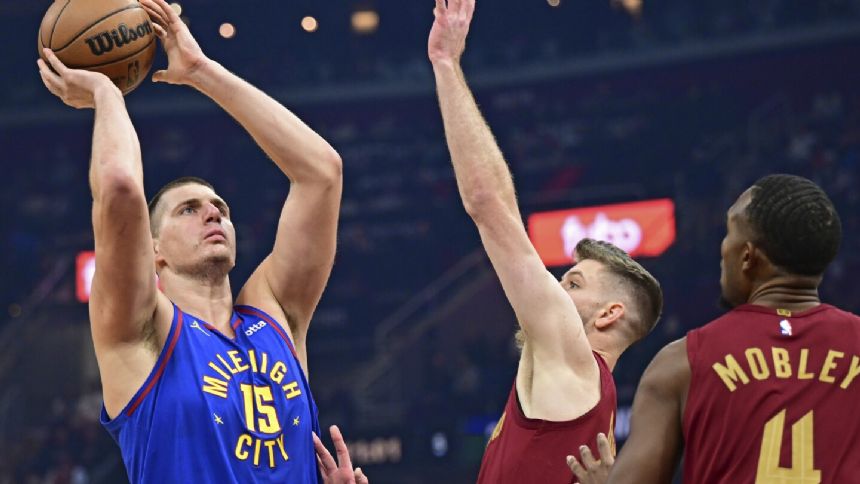 Darius Garland scores 26 points as the Cavaliers beat the defending champion Nuggets 121-109