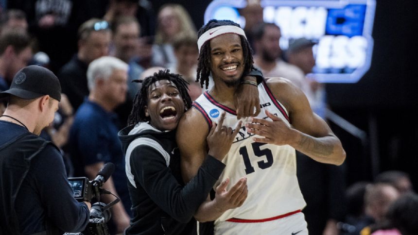 DaRon Holmes II and Dayton rally from 17 points down to beat Nevada 63-60 in March Madness