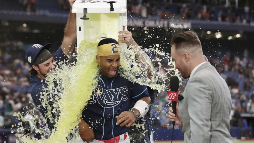 Diaz hits a 2-run homer in the 9th inning to give the Rays a 7-5 win over the Mariners