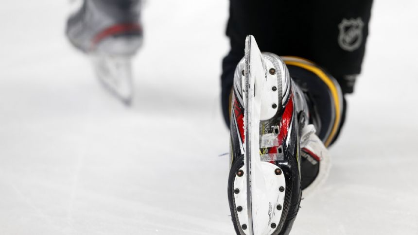 Death of a player from a skate to the neck reignites hockey's stubborn debate over protective gear