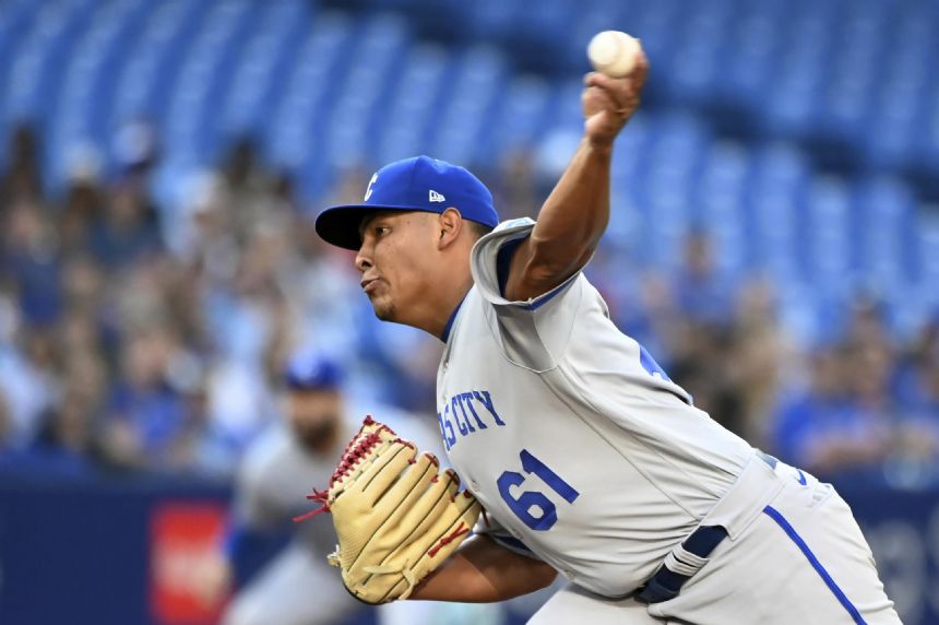 Depleted Royals overcome 10 absent players, beat Jays 3-1