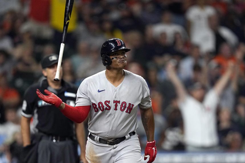 Devers homers in return from IL as Boston downs Astros 2-1