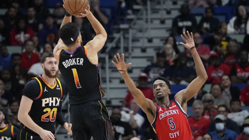 Devin Booker scores 52 points to lift the Suns over the Pelicans 124-111