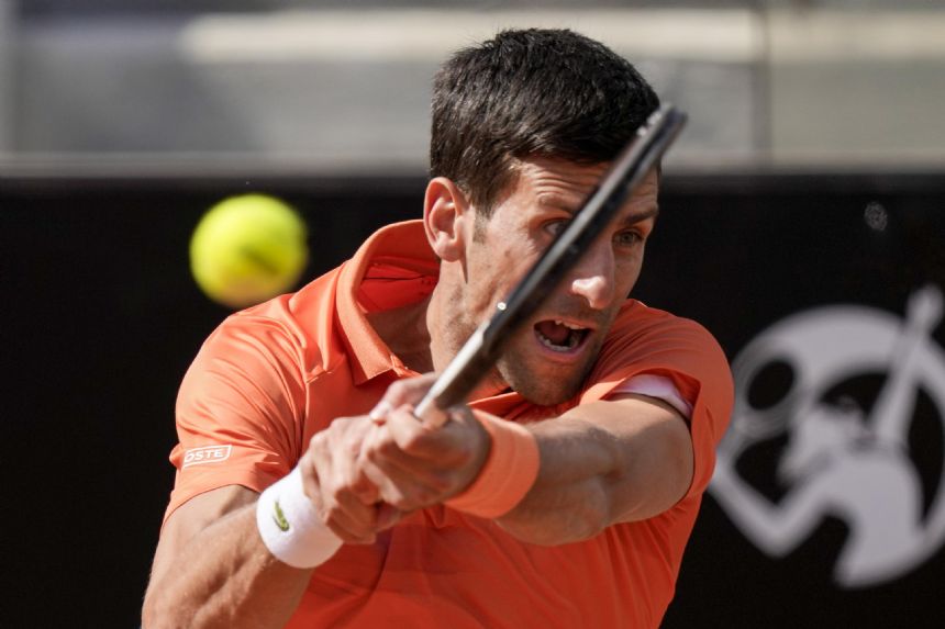 Djokovic wins opener at Italian Open with vintage scrambling