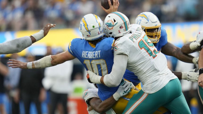 Dolphins' defense hoping to adjust, stop the run after poor performance against Chargers