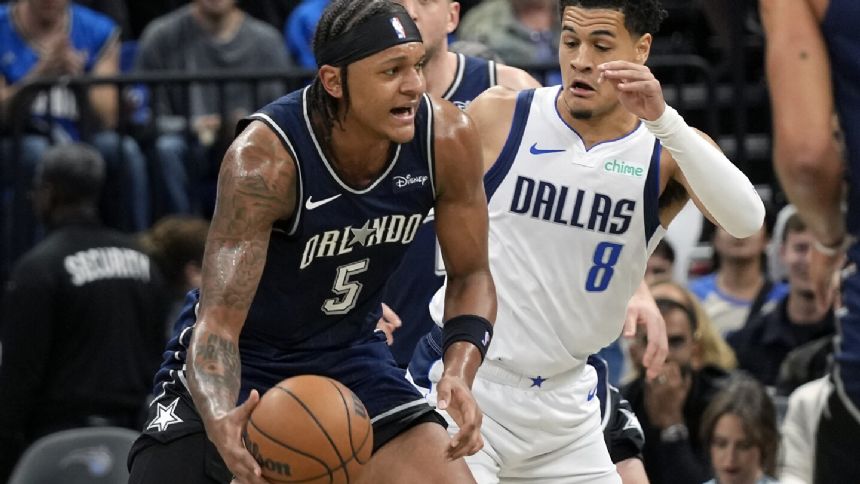 Doncic returns after bumping head, scores 29 as Mavs rally again, beat Magic 117-102