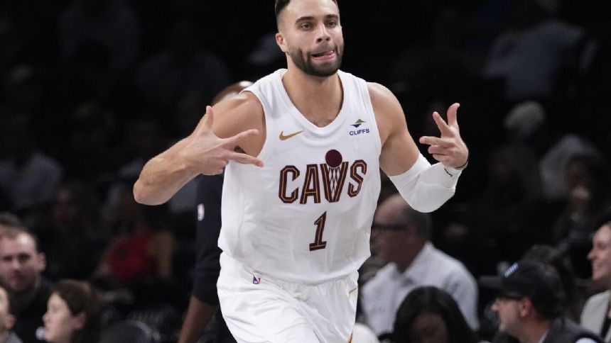 Donovan Mitchell scores 27 points as Cavaliers top Nets 114-113 in season opener