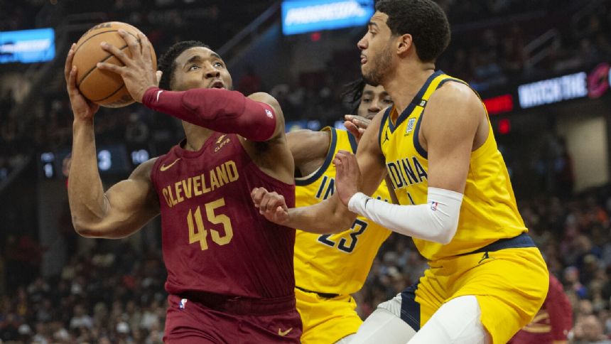 Donovan Mitchell scores 33 points, Cavaliers clinch playoff spot with 129-120 win over Pacers