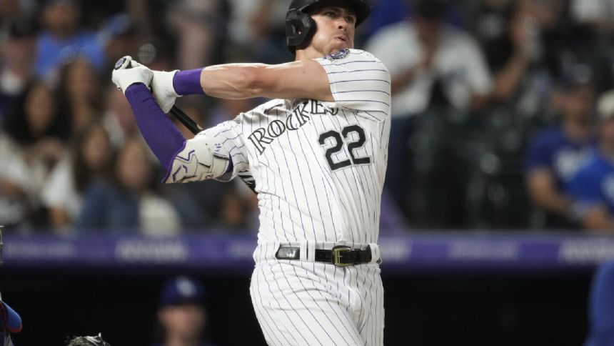 Doyle drives in 4 runs and Montero finishes a triple shy of cycle as Rockies beat Dodgers 14-5