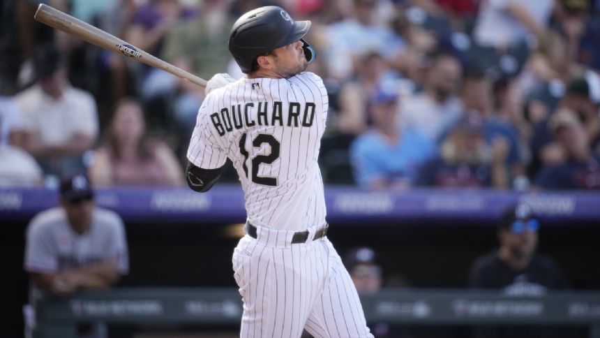 Doyle scores from 2nd on wild pitch by outfielder-turned-pitcher Luplow in 11th, Rox beat Twins 3-2