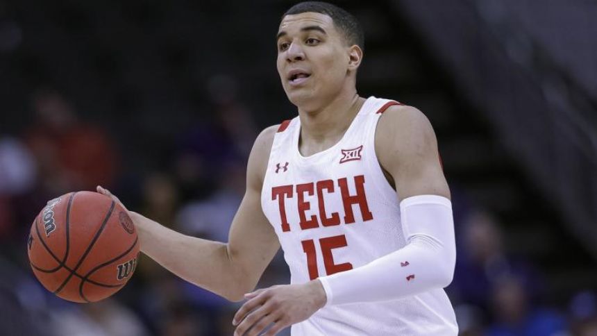 Dribble Handoff: Kevin McCullar, Tyrese Hunter among picks for college basketball's top impact transfer