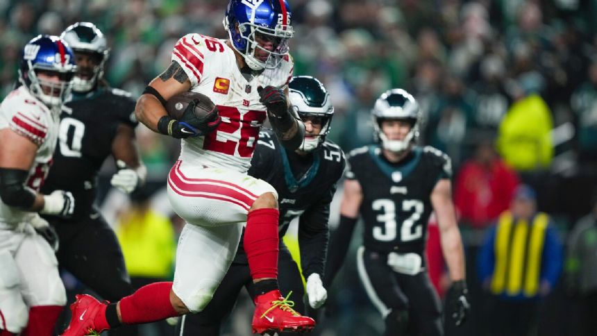 Eagles reach free-agent deals with Bryce Huff and Saquon Barkley, AP source says