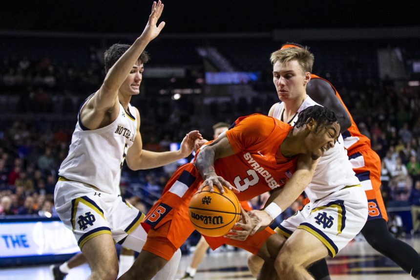 Edwards, Girard lead Syracuse over Notre Dame 62-61