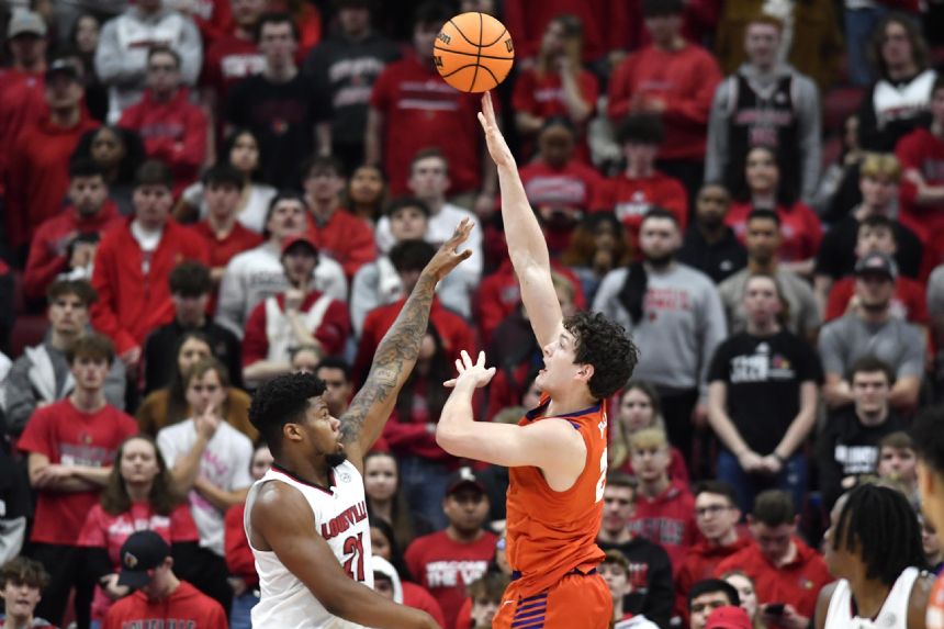 Ellis scores 28 to spark Louisville past Clemson, 83-73